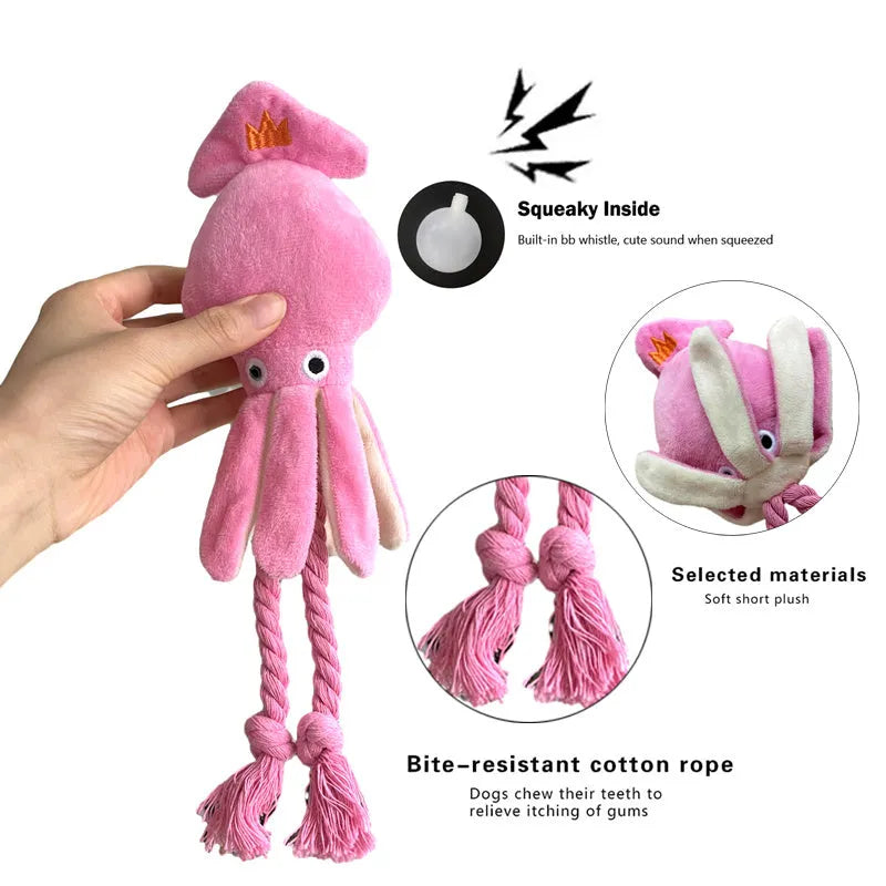 Pink squid-shaped corduroy dog chew toy with a squeaker.