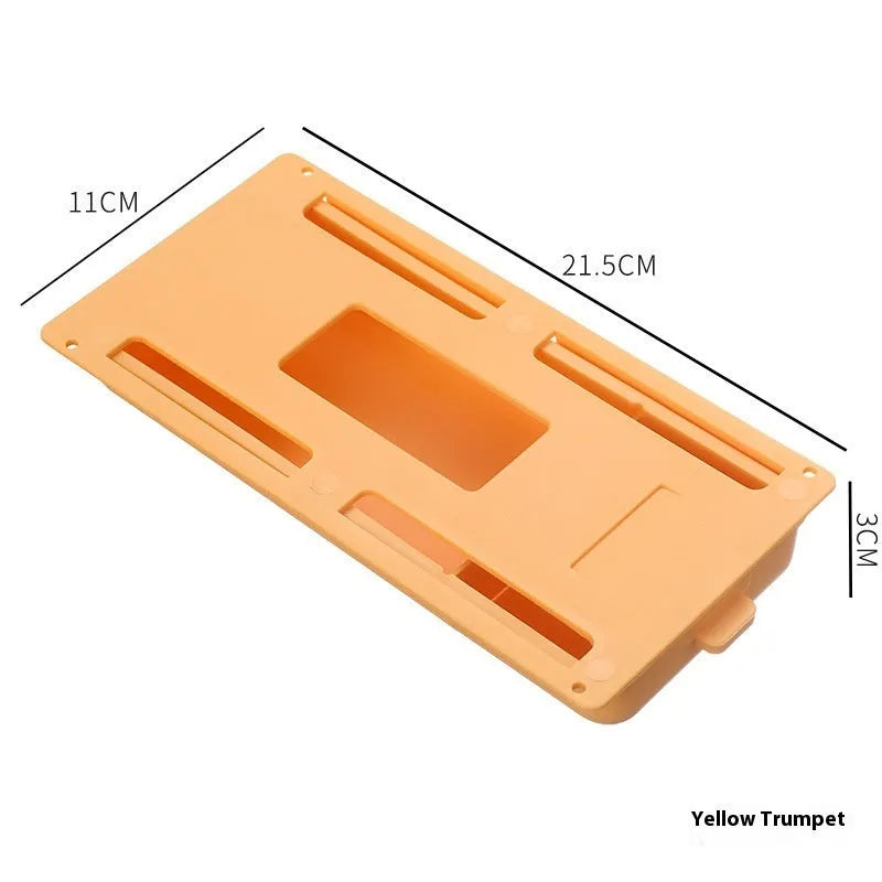 White plastic storage drawer with a cover and internal grid compartments, shown mounted underneath a wooden table.