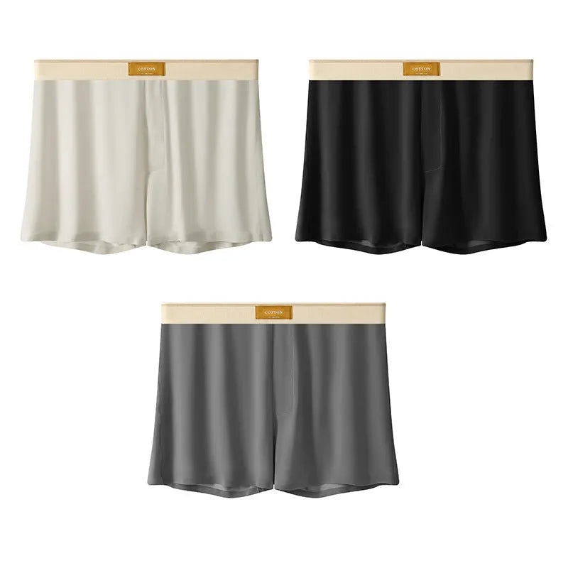 Men's solid colour ice silk underwear with a loose fit and mid waistband on a neutral background.
