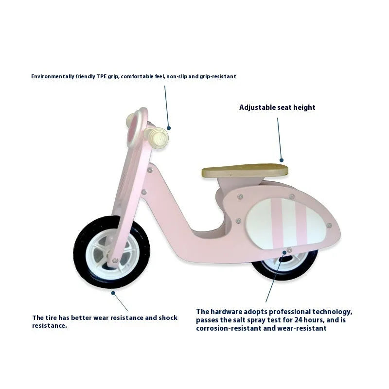 Pink wooden balance scooter for toddlers and children, 10 inches in size.