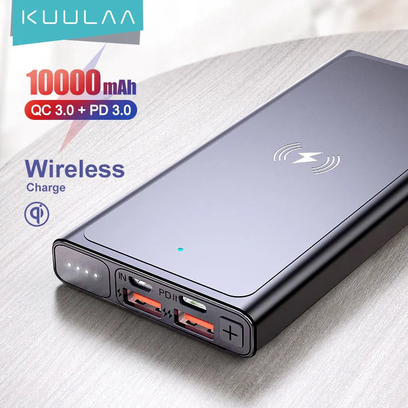 Black and blue alloy-shell portable power bank showing wireless charging symbol and 10000mAh capacity label