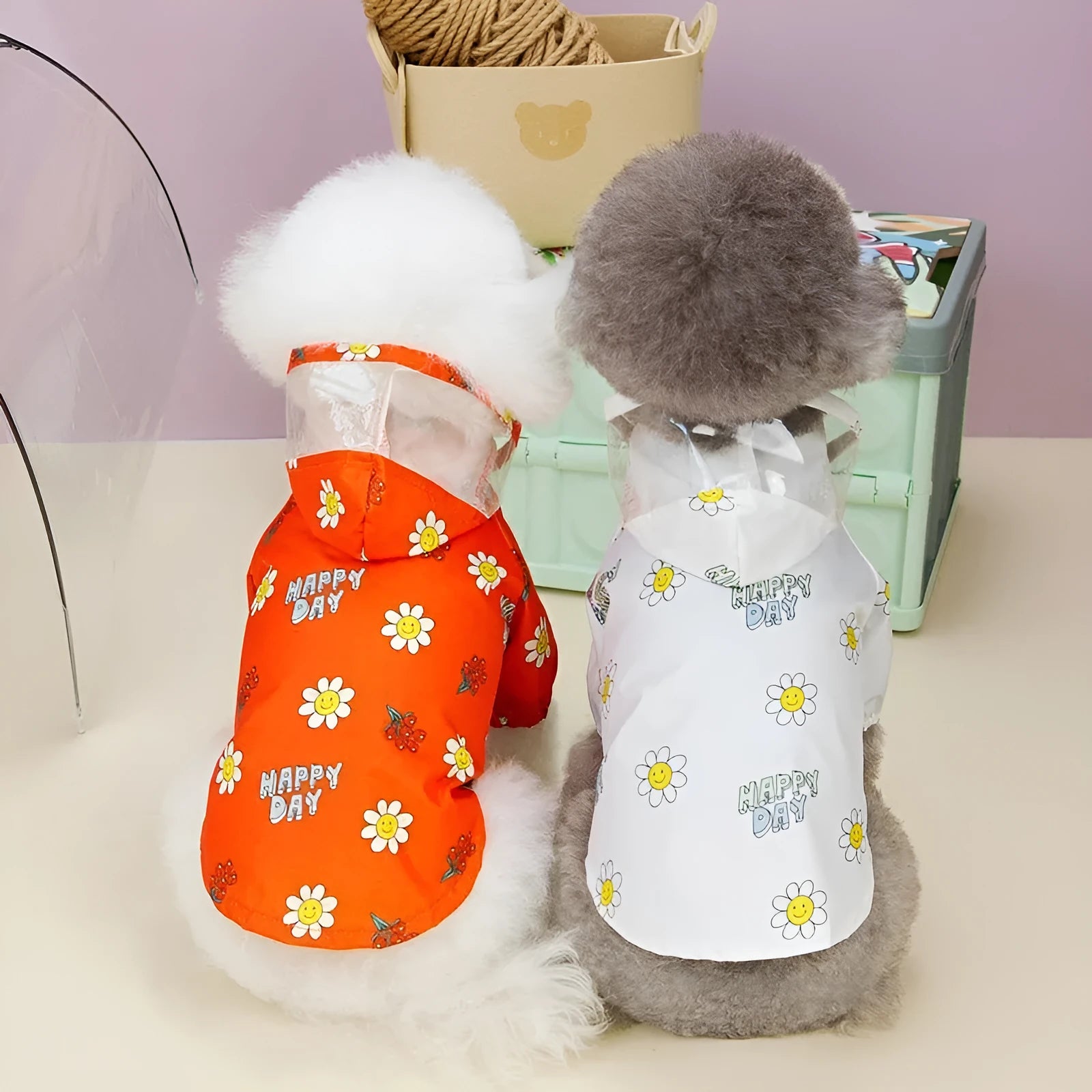 Transparent dog raincoat with pull ring and two-foot coverage in orange or white colour options