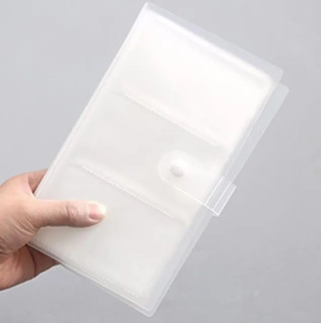 Blue PVC and PP business card holder book with protective shell and smile logo, showing insert pocket.