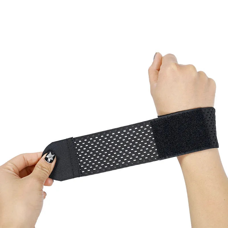 Athletic wristguards in black, gray, and pink colours showing elastic breathable fabric construction