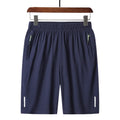 Men's polyester solid colour beach casual sports shorts with zippered pocket in black, gray, and blue