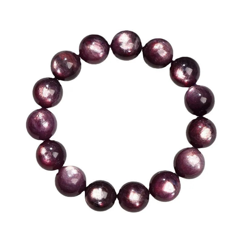 Purple lepidolite crystal round bead bracelet with polished finish and adjustable closure on a wrist.