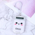Cookie-shaped mini plastic calculator with key ring, 6.4cm x 3.6cm x 11.2cm, in pink, blue, grey, or black