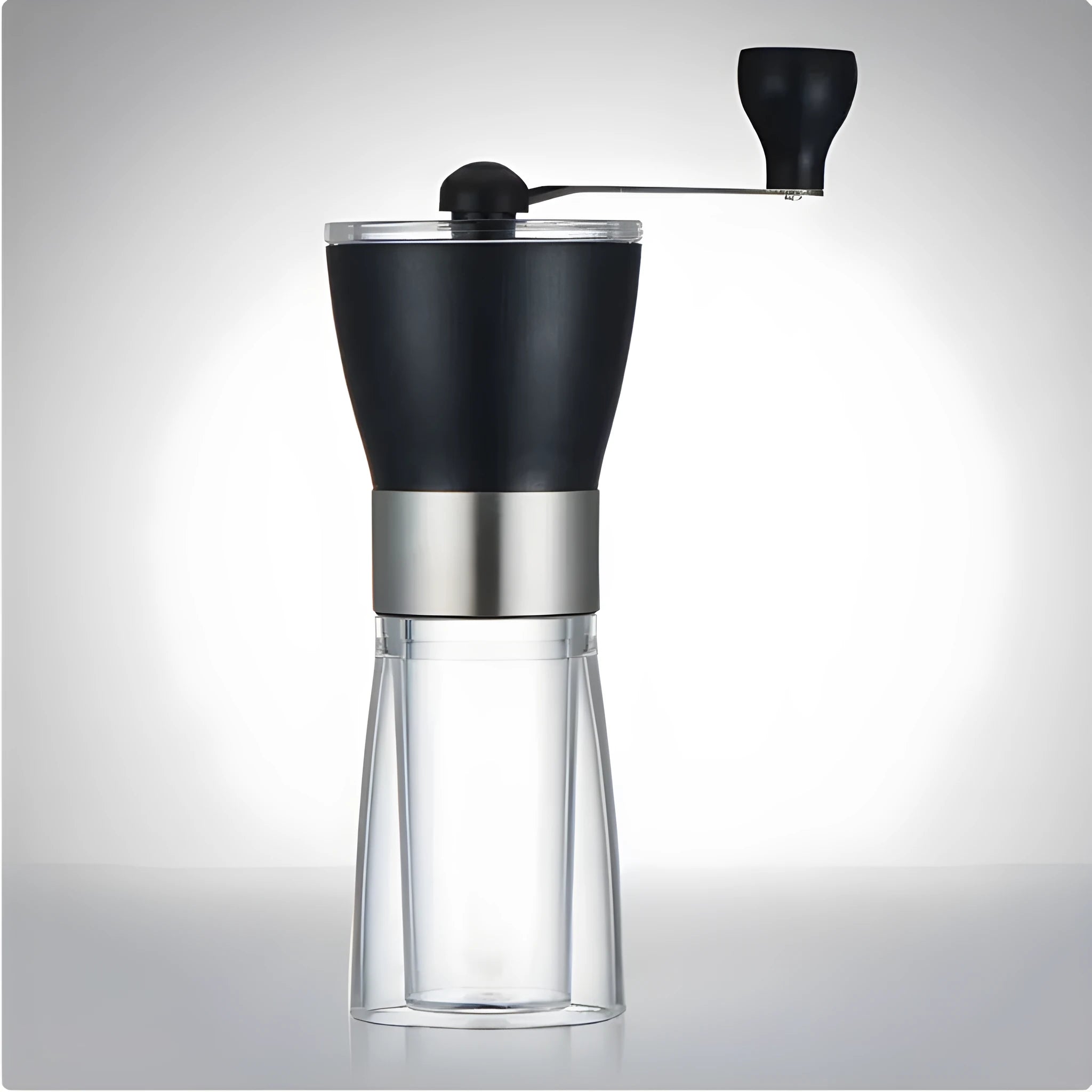 Hand coffee grinder 6cm by 17cm 310g black manual burr grinder on white background