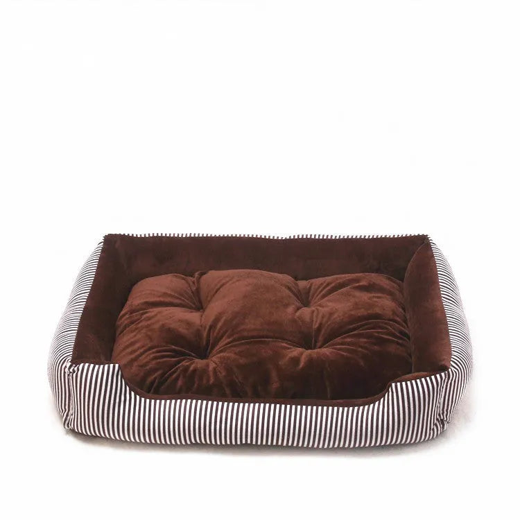 A grey and white striped bolster-sided pet bed for dogs or cats with a removable cloth cover.