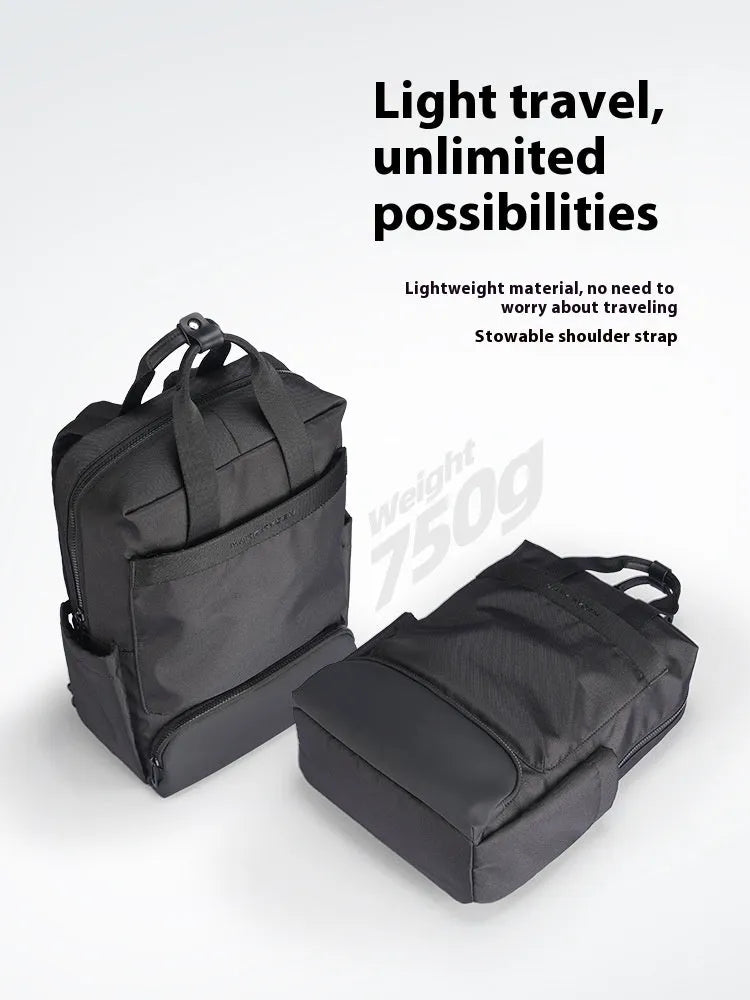 Black Oxford cloth computer backpack showing storage compartments and 20-35 litre capacity
