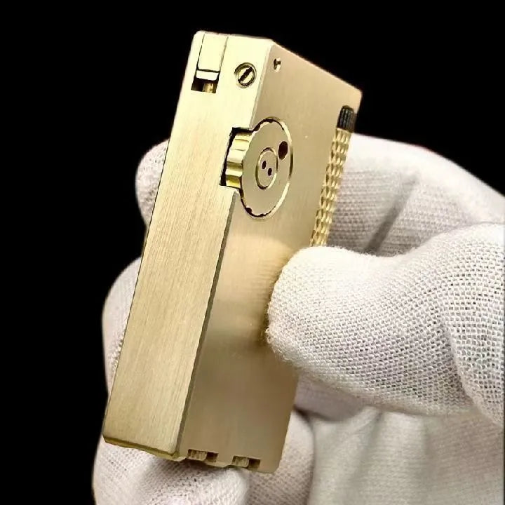 Brass metal lighter with copper flint warehouse and side sliding ignition mechanism