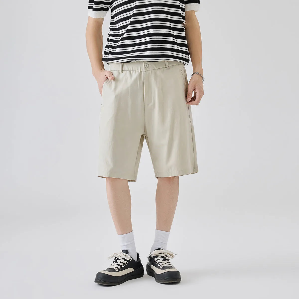 Men's casual cotton blend lyocell shorts in apricot colour showing loose fit and simple style