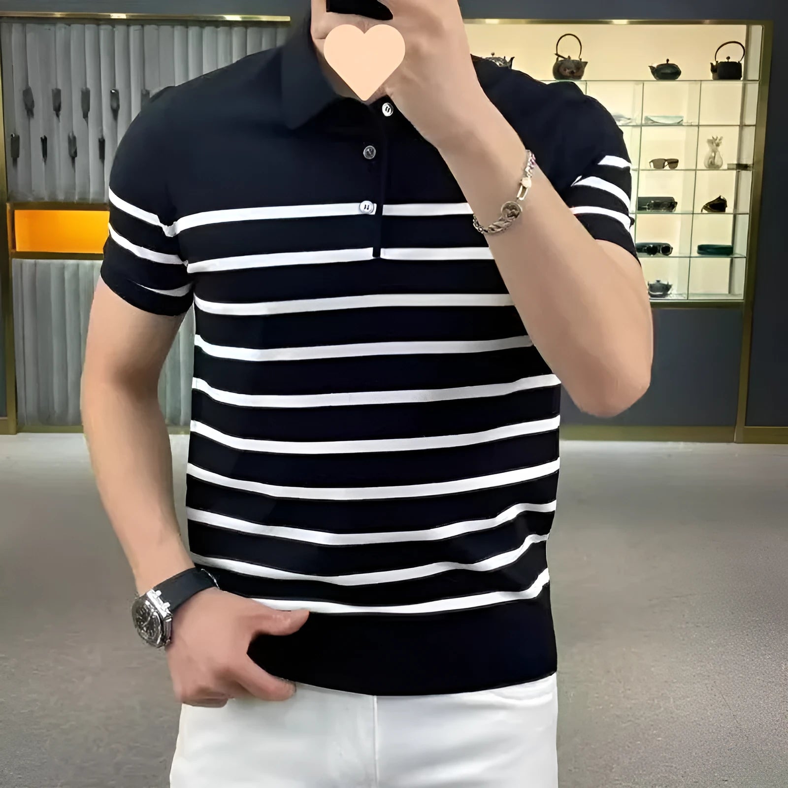 Black and white striped knitted T-shirt with distinctive lapel collar