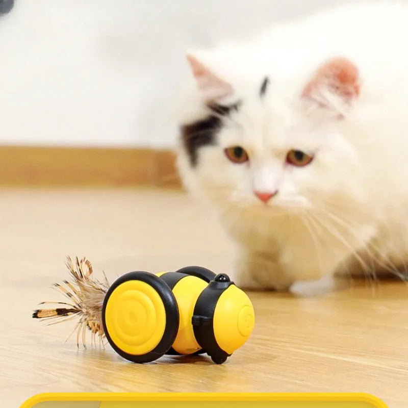 Electric bee-shaped cat toy with moving feather teaser in pink or yellow colours
