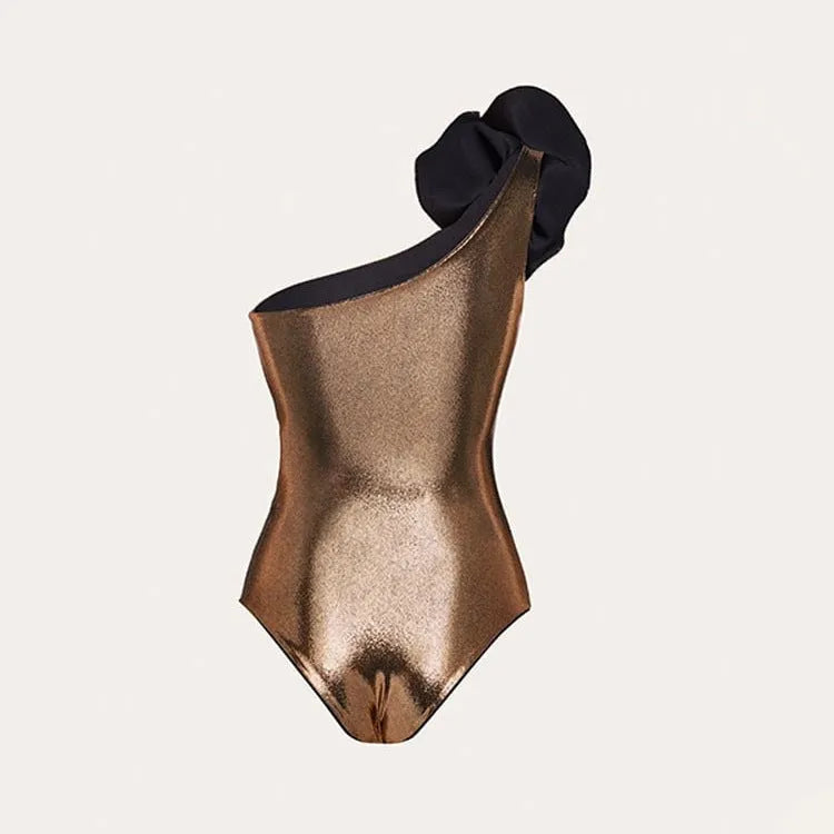Gold handmade halter neck one-piece swimsuit with hollow-out detailing on a mannequin.