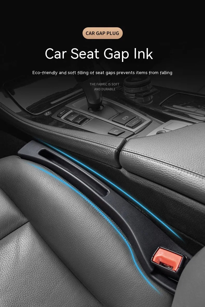 Black plastic car seat gap storage organiser box with handle between vehicle seats