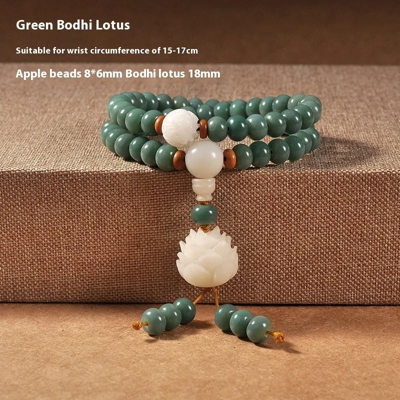 White jade green Bodhi seed bracelet with a safety buckle and lotus charm.