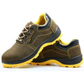 Bronze coloured cow suede leather safety shoes with a steel toe cap and low-cut design.