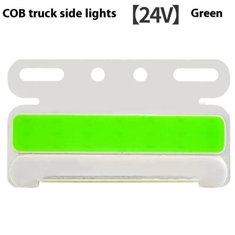 Aluminium alloy COB LED truck side light projecting bright white light onto ground next to tyre.
