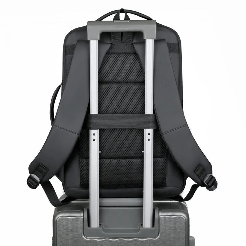 Black waterproof Oxford cloth backpack with curved shoulder strap showing 20-35L capacity for business travel