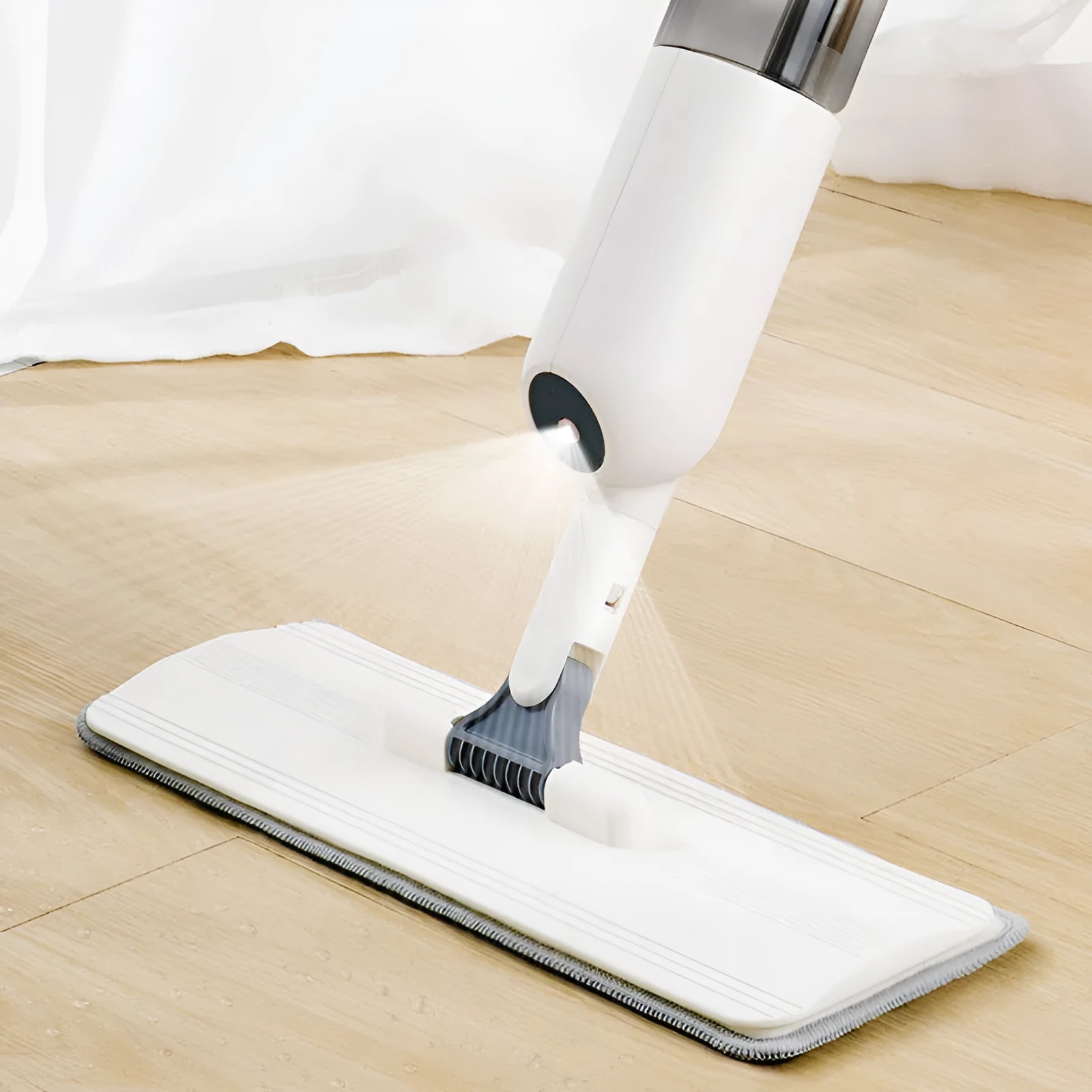 Flat squeeze mop with bucket wringing system showing 360-degree rotation and stainless steel construction