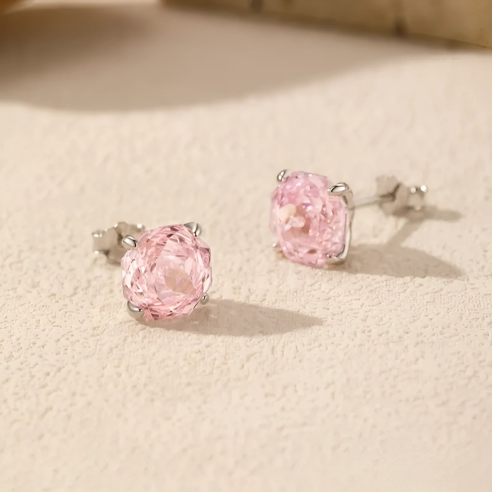 A pair of S925 sterling silver rose flower stud earrings for women, shown in 6mm and 8mm sizes.