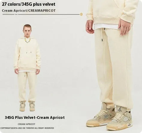 Men's solid colour cotton velvet sweatpants with elastic waist and ankle banding detail