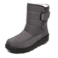 Women's waterproof snow boots with canvas upper, PU sole, buckle closure, and belt decoration