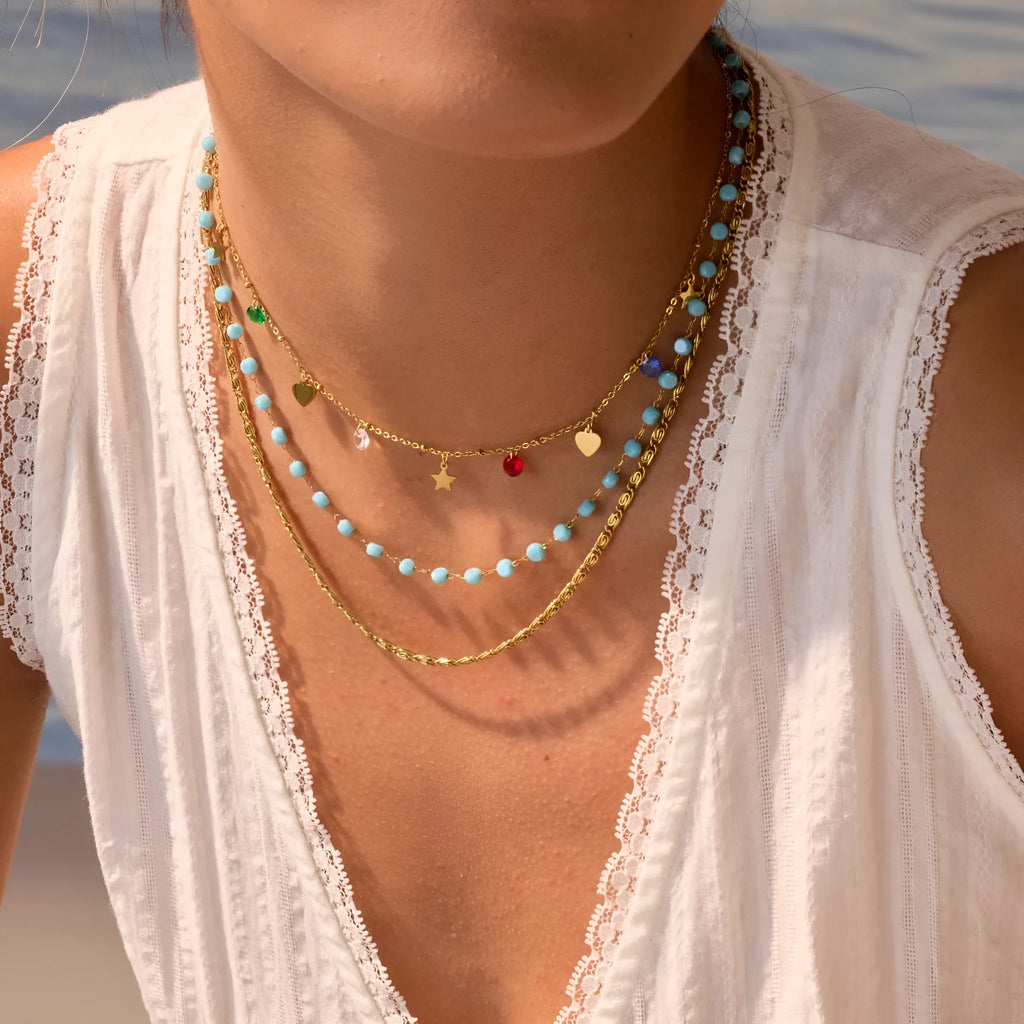 Stainless steel zircon necklace clavicle chain with beaded blue bracelet set geometric pendant on white background