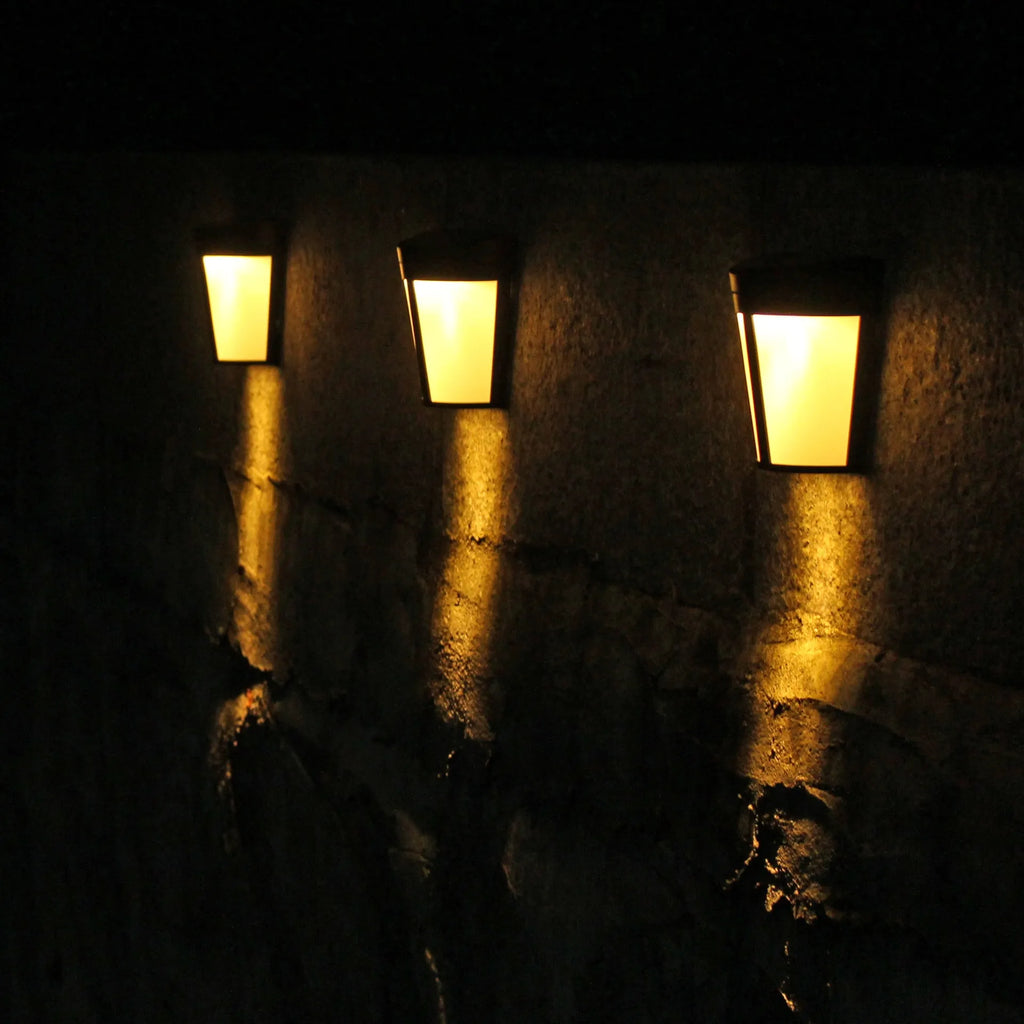 Solar-powered outdoor wall lamp with 6 LEDs for garden and pathway lighting