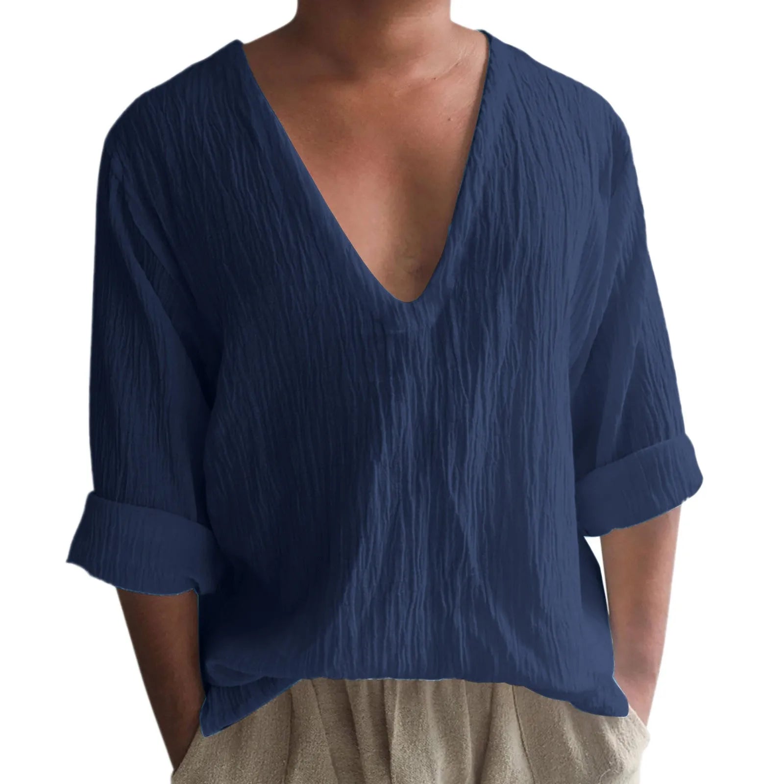 Man wearing a washed cotton long sleeve V-neck t-shirt in a solid colour.
