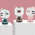 Cartoon style animal table lamp with plastic shade in random colour variation showing bear cattle rabbit or tiger design