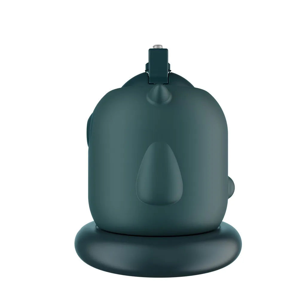 Dark green intelligent AI face tracking gimbal with 360-degree rotation on a table.