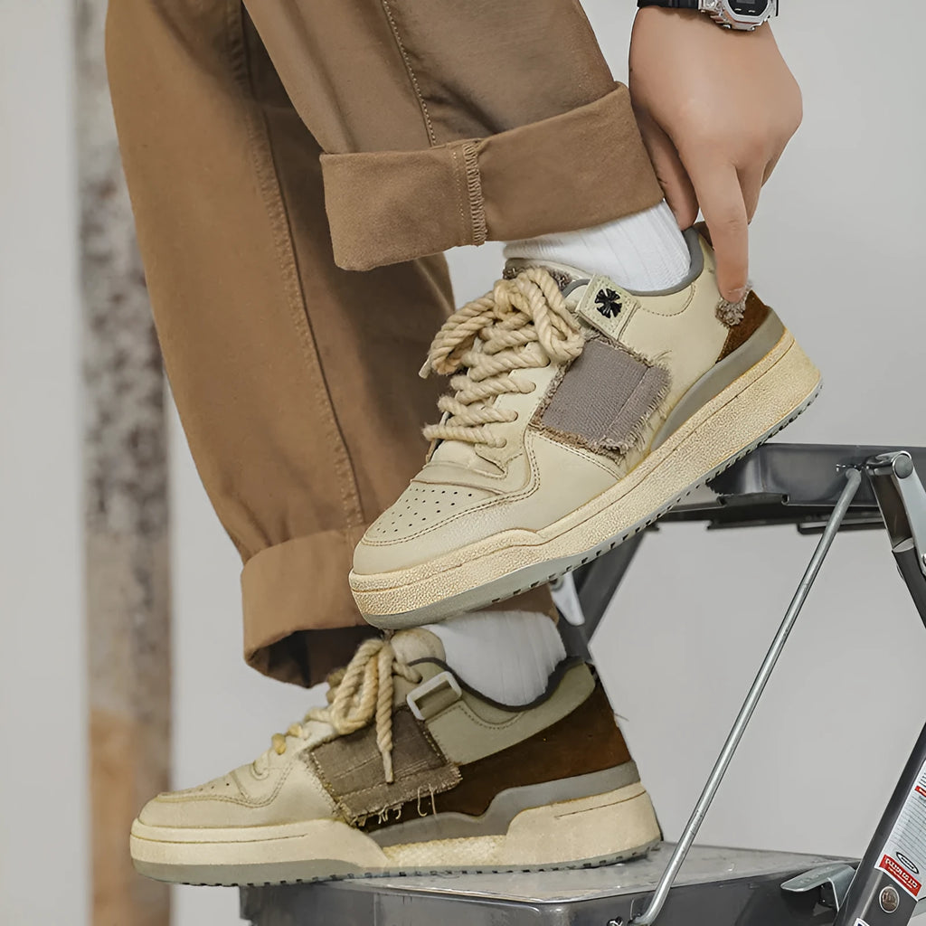 Beige low-top skateboard shoes with microfiber upper and round-toe design