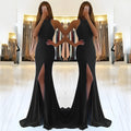 Red knitted long evening dress with high waist, large swing skirt, and hollow out detail on a mannequin.
