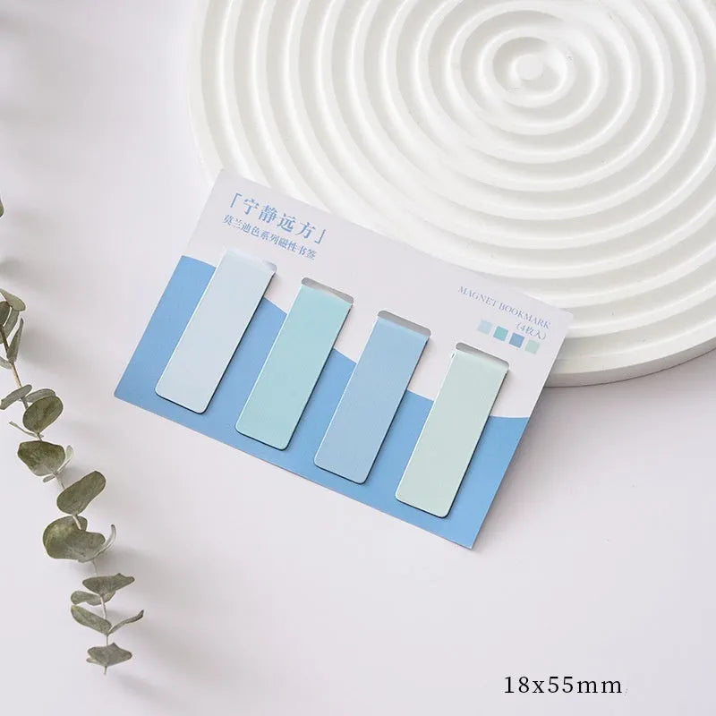 Set of four miniature magnetic bookmarks in soft Morandi series colour blocks on a white background.
