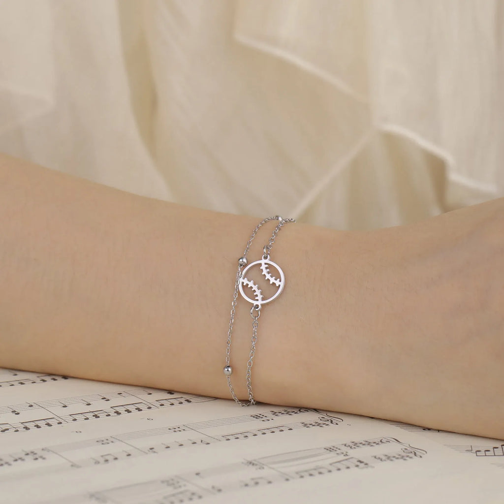 Unisex stainless steel bracelet with hollow baseball design and double-layer chain in gold or steel colour