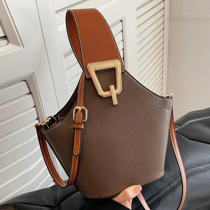Light luxury commuter crossbody women's basket bag in PU leather bucket shape with internal phone pocket