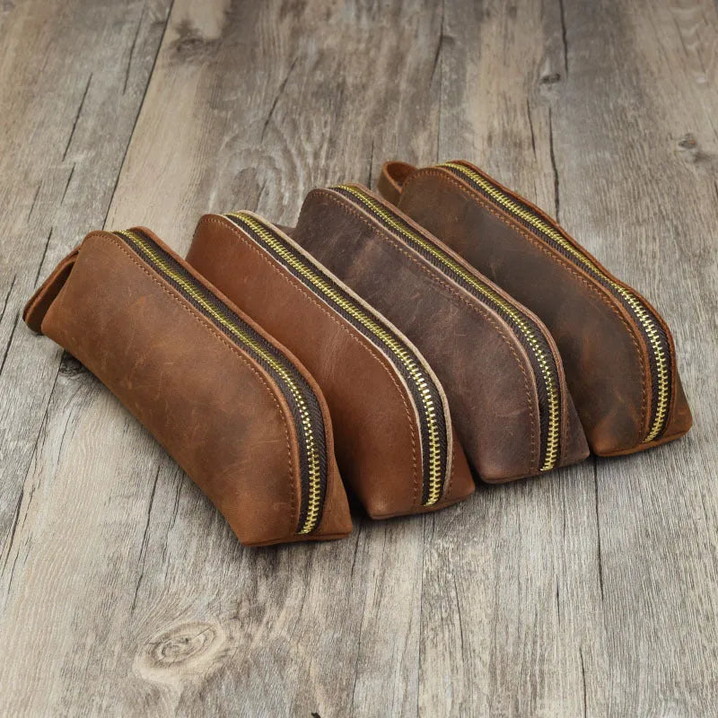 Genuine cowhide leather pencil case with zipper closure measuring 18cm long