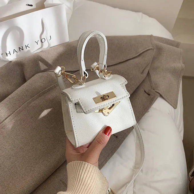 Mini one shoulder crossbody handbag, PU small square bag with lock closure, solid colour, front view