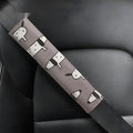 Cute Dachshund cartoon design on a black PU leather car seat belt shoulder protector sleeve.
