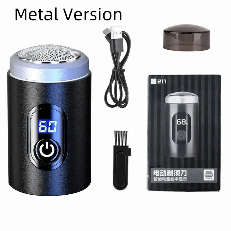 Black mini USB rechargeable electric shaver with cleaning brush and charging cable on a white background.