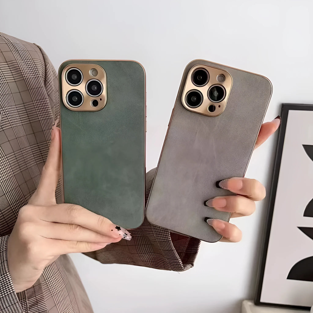 Slim black leather texture phone case fitted on an iPhone 14, showing textured finish and precise camera cutouts.