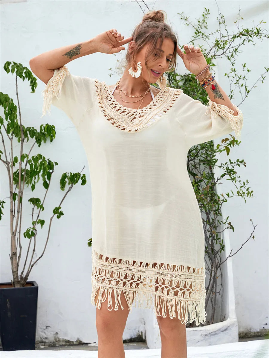 Apricot coloured hand-crocheted women's beach dress with a lining.
