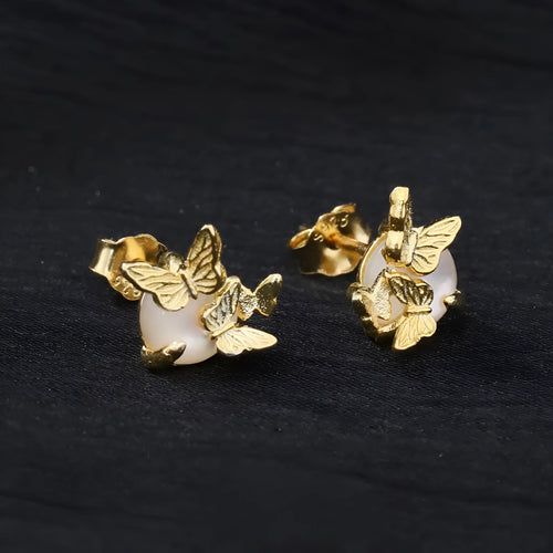 A pair of butterfly-shaped stud earrings in sterling silver with gold colour finish.