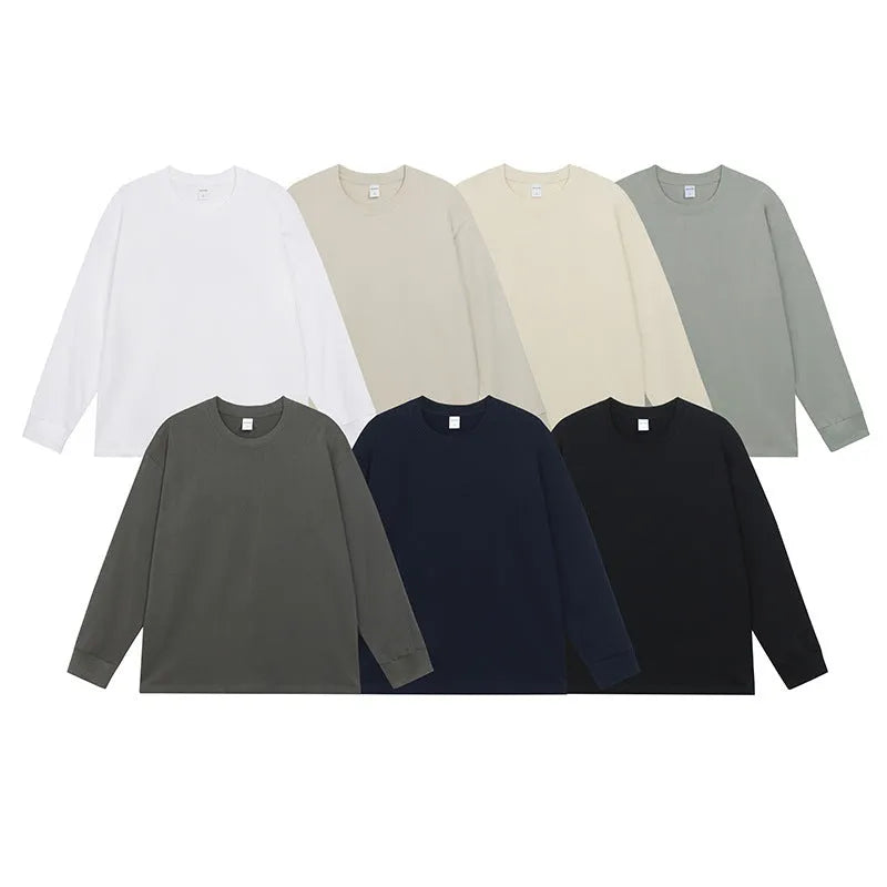 Men's loose-fit pure cotton long-sleeved T-shirt shown in a solid colour, with a pullover design.