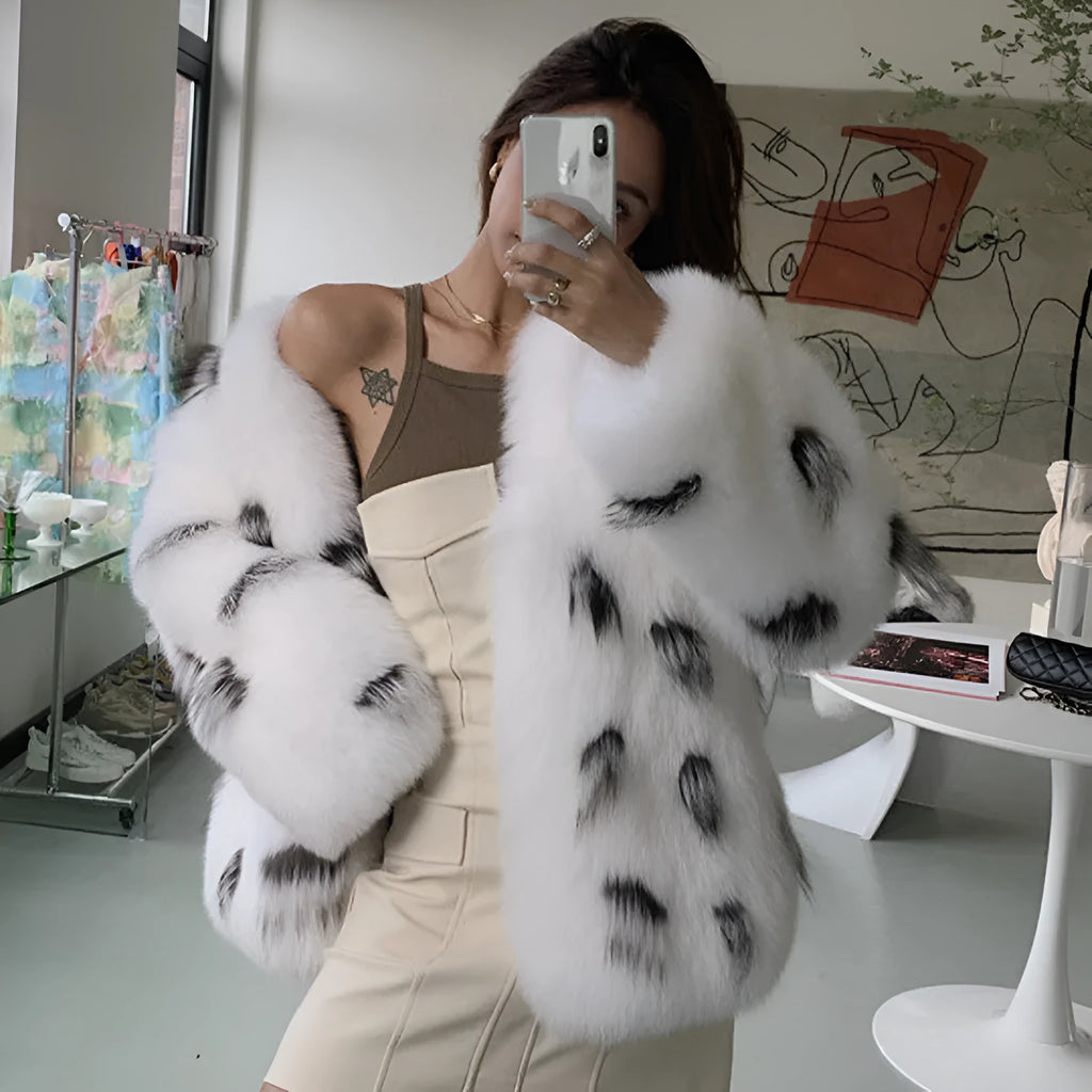 Black and white plus size women's faux fur coat with a slim fit and short length.