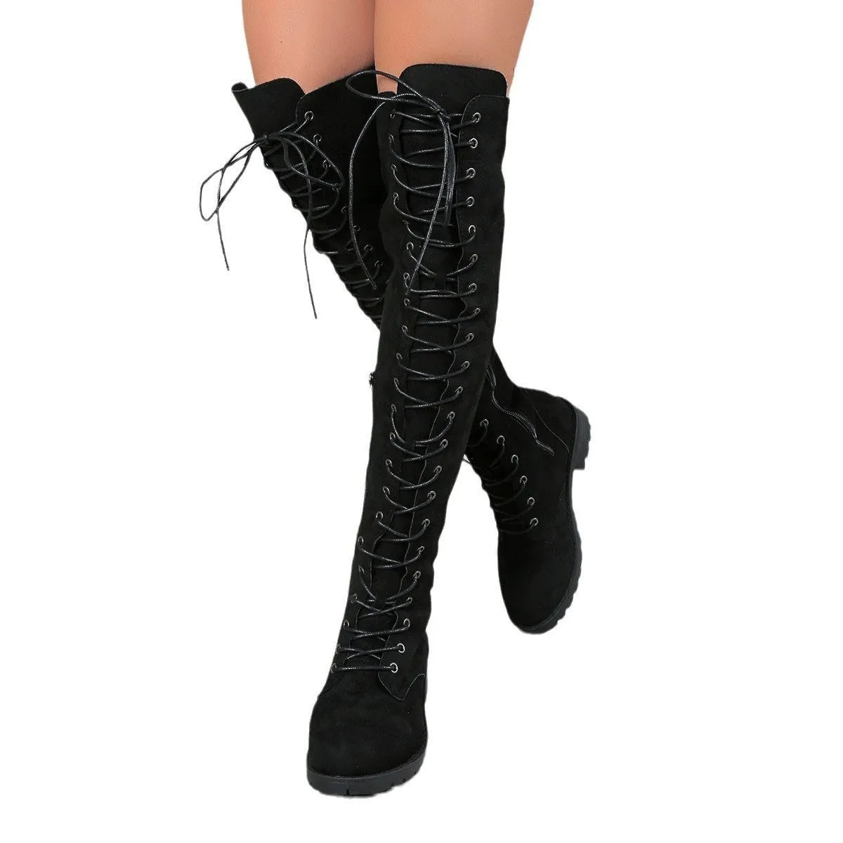 Black lace-up over-the-knee boots with a round toe and flat sole on a neutral background.