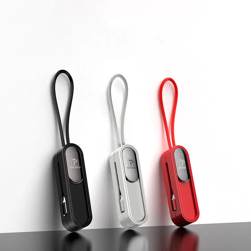 Magnetic three-in-one mobile phone charging cable with black, white, and red colour-coded tips