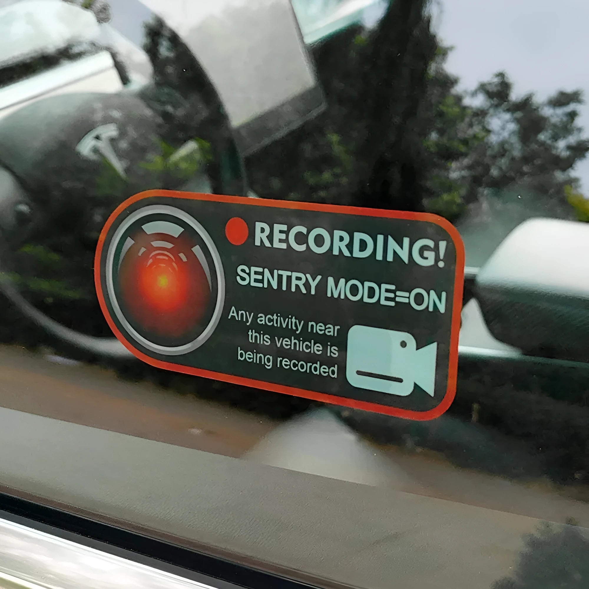 Tesla Sentry Mode warning stickers with electrostatic PVC construction measuring 11x5 cm